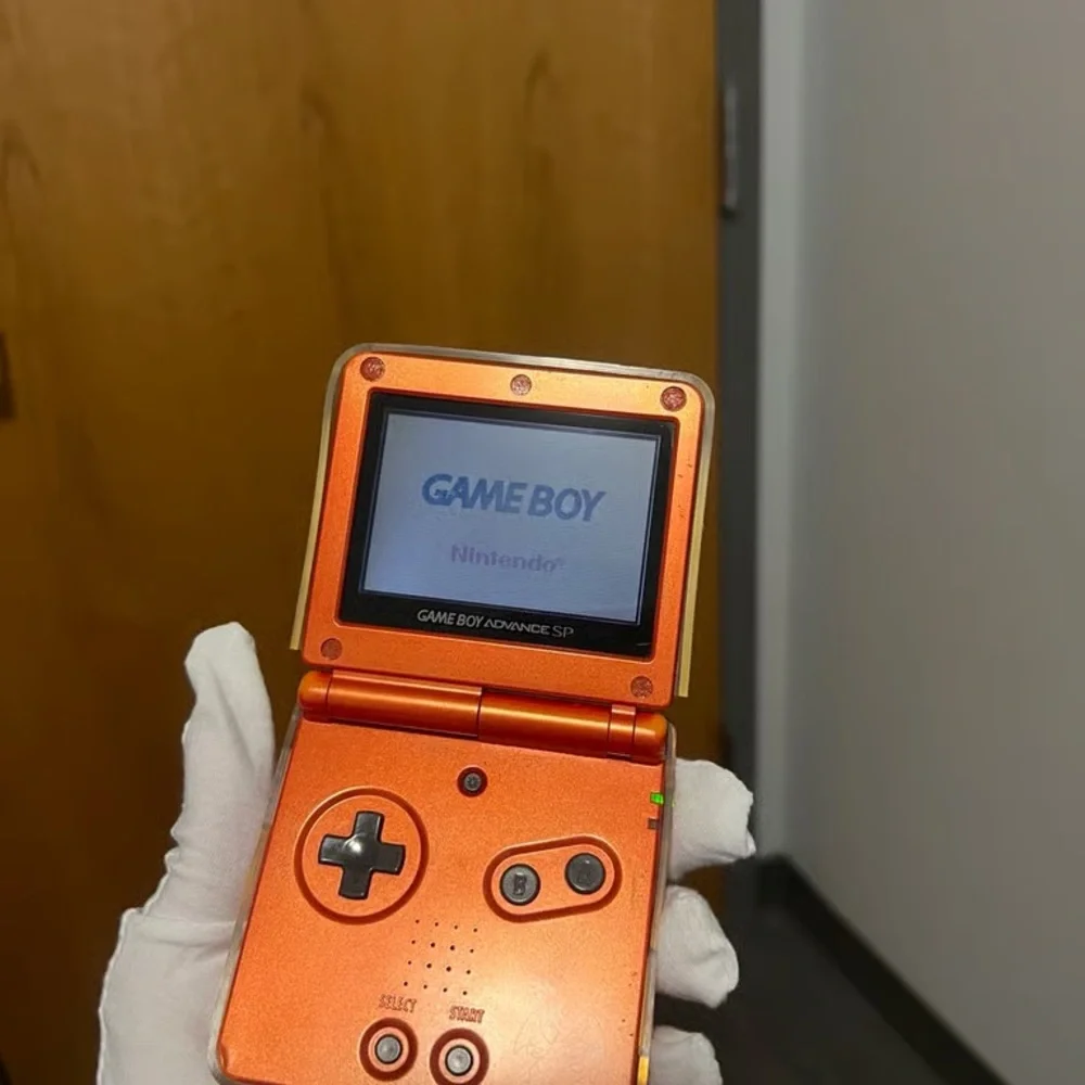 Nintendo Game Boy Advance SP Pokémon Center Charizard EditionConsole AGS-001